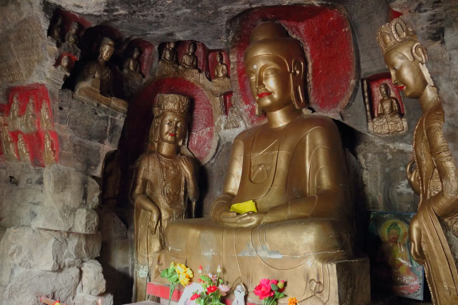 Buddhist stone carvings on Thousand Buddha Mountain, Jinan, photographed in 2012; the photo is not a panorama of the whole hill or temple