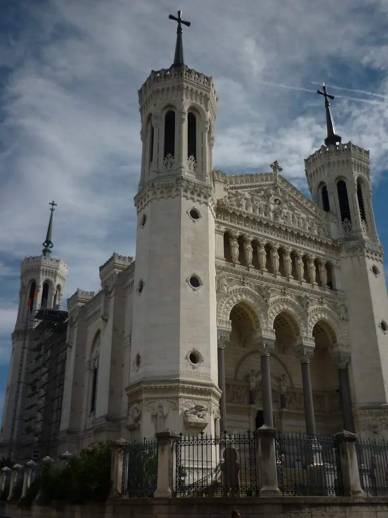 West side exterior of the Basilica of Notre-Dame de Fourvière, photographed in 2010; it does not show the interior or opening status on the day
