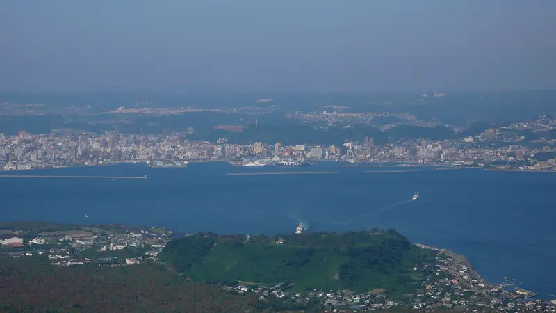 Kinko Bay and Kagoshima Port seen from Sakurajima, with the city on the far shore